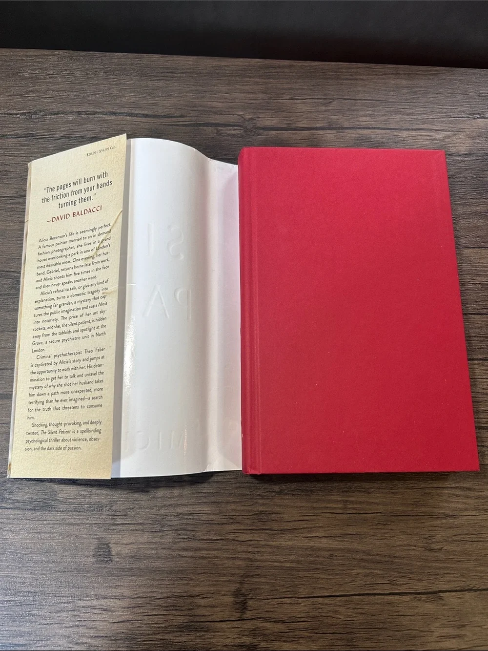 The Silent Patient by Alex Michaelides Hardcover Book - Cream with Red Text